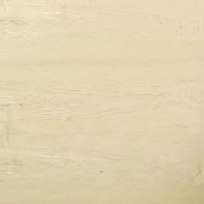 a close up of a piece of white wood .