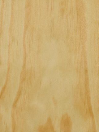 a close up of a piece of plywood showing the grain of the wood .