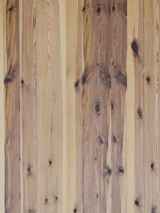 a close up of a piece of wood with a grain and texture .