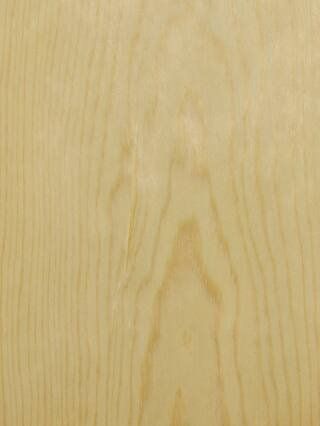 a close up of a piece of wood showing the grain and texture .