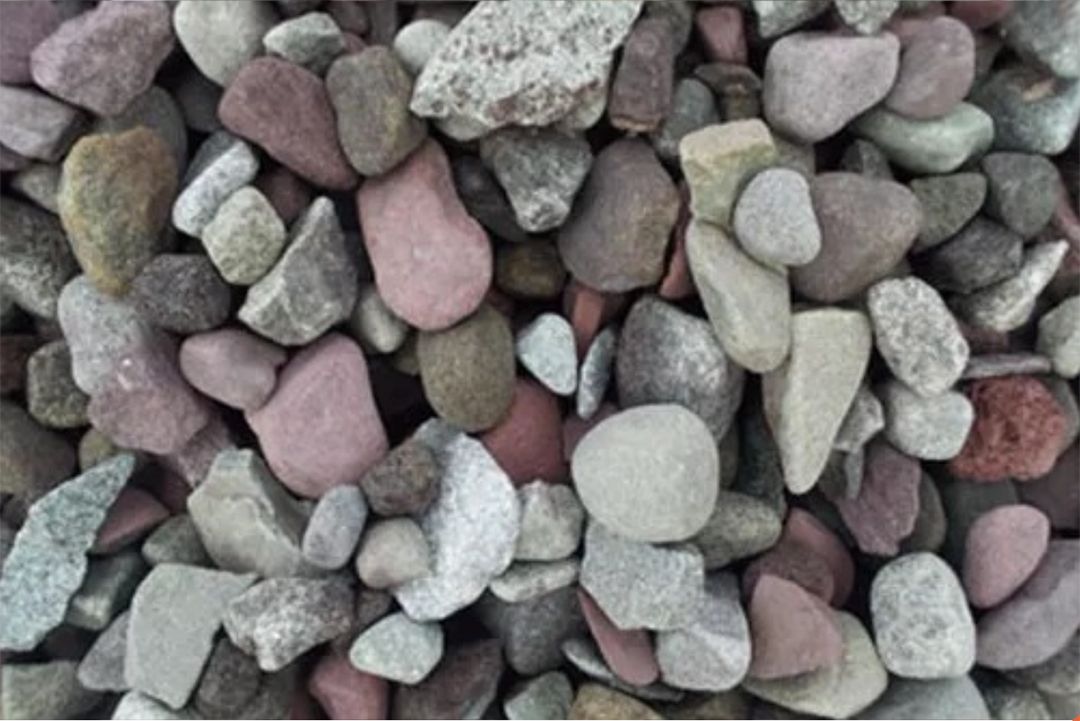 A pile of rocks of different colors and sizes.