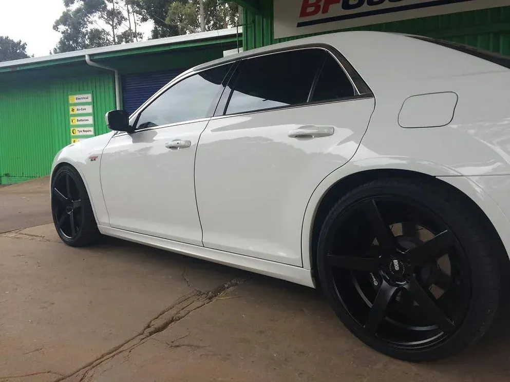 White Auto with Black Wheels Close-Up — Manjimup, WA — Manjimup Tyre Mart & Auto Electrical Services