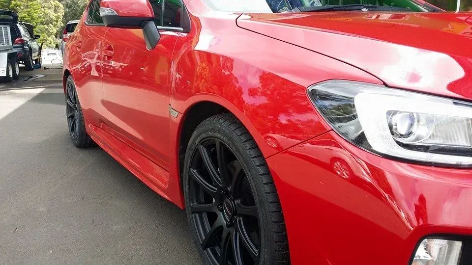Red Car with Black Wheels — Manjimup, WA — Manjimup Tyre Mart & Auto Electrical Services
