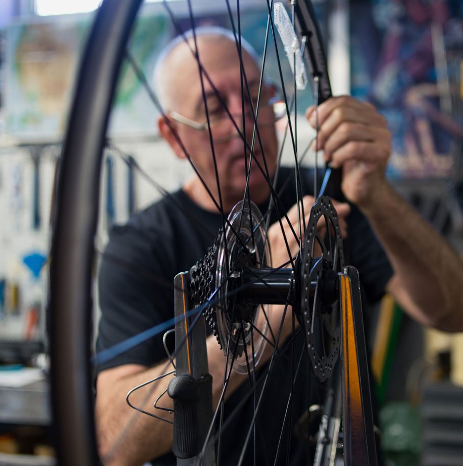 Man Fixing Bike