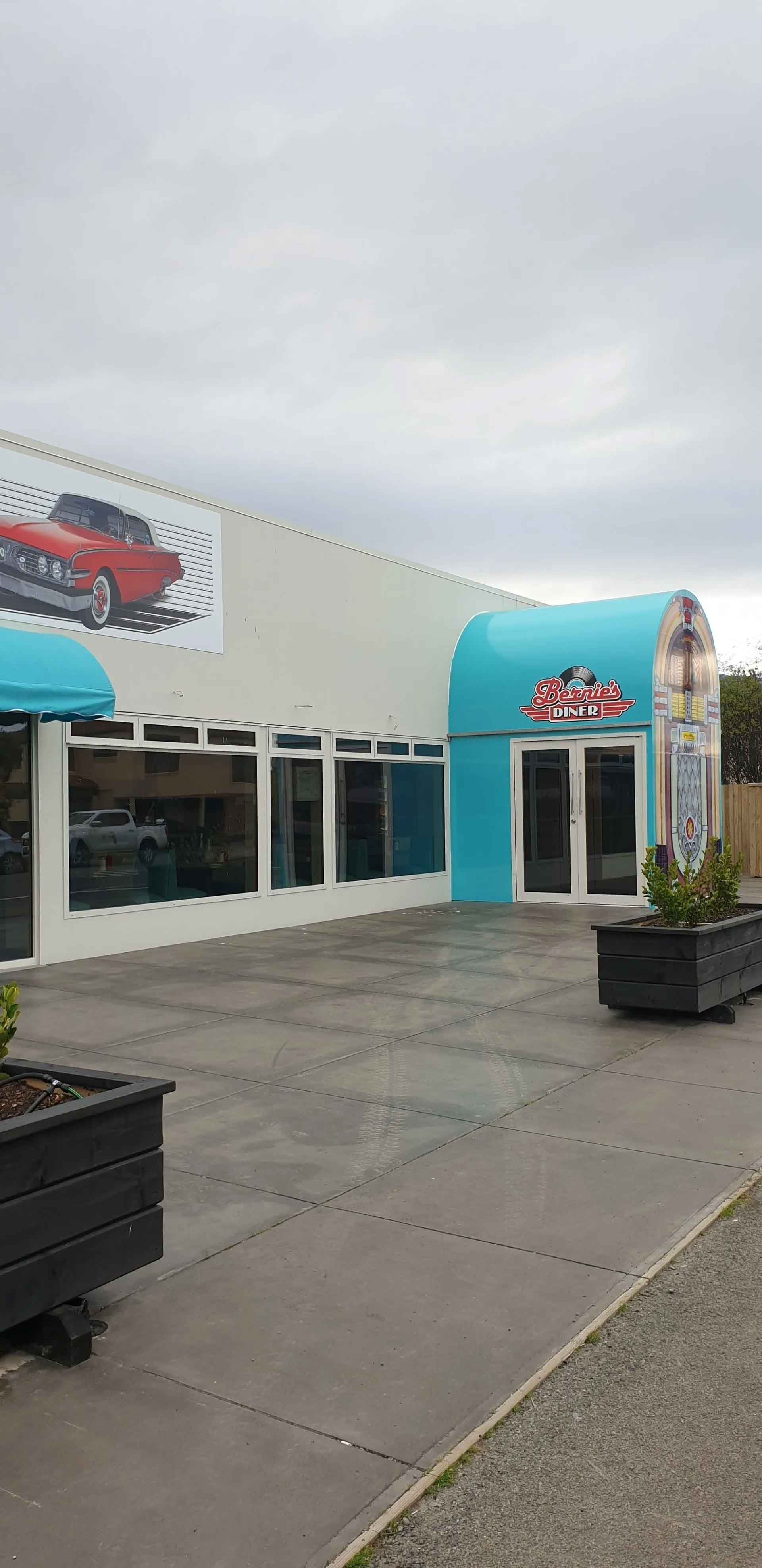 A close up of a sliding glass door with a screen on it.