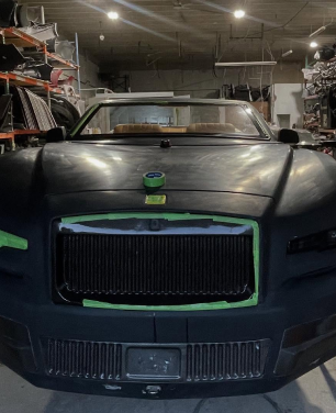 Up close to black car in progress of new paint | Flame Auto Repair