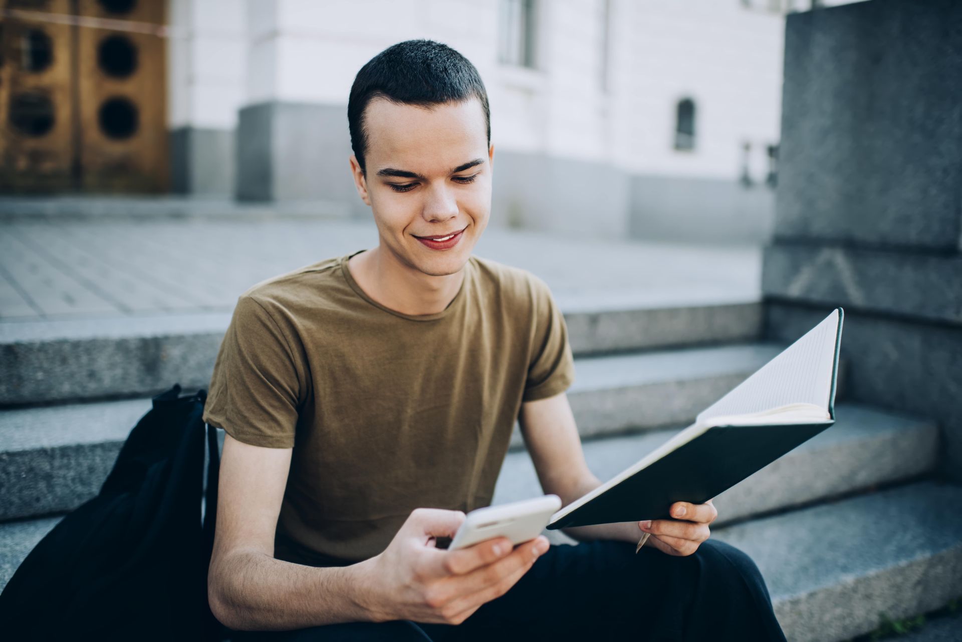 A young person with pink hair is wearing a fur coat and sunglasses.