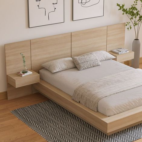 A bed with a wooden headboard and two nightstands in a bedroom