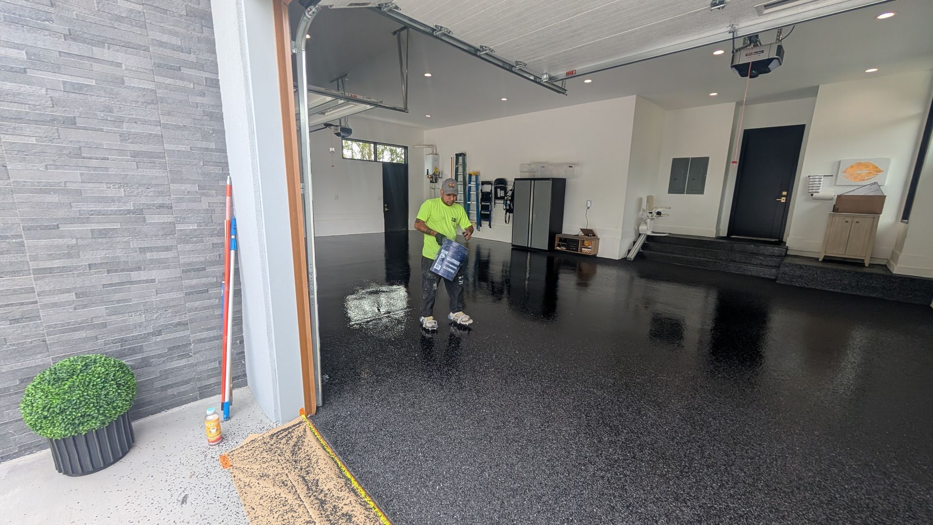 Epoxy flake finish in modern indoor space installed by Zachary Daniel Concrete in Simpsonville, SC.