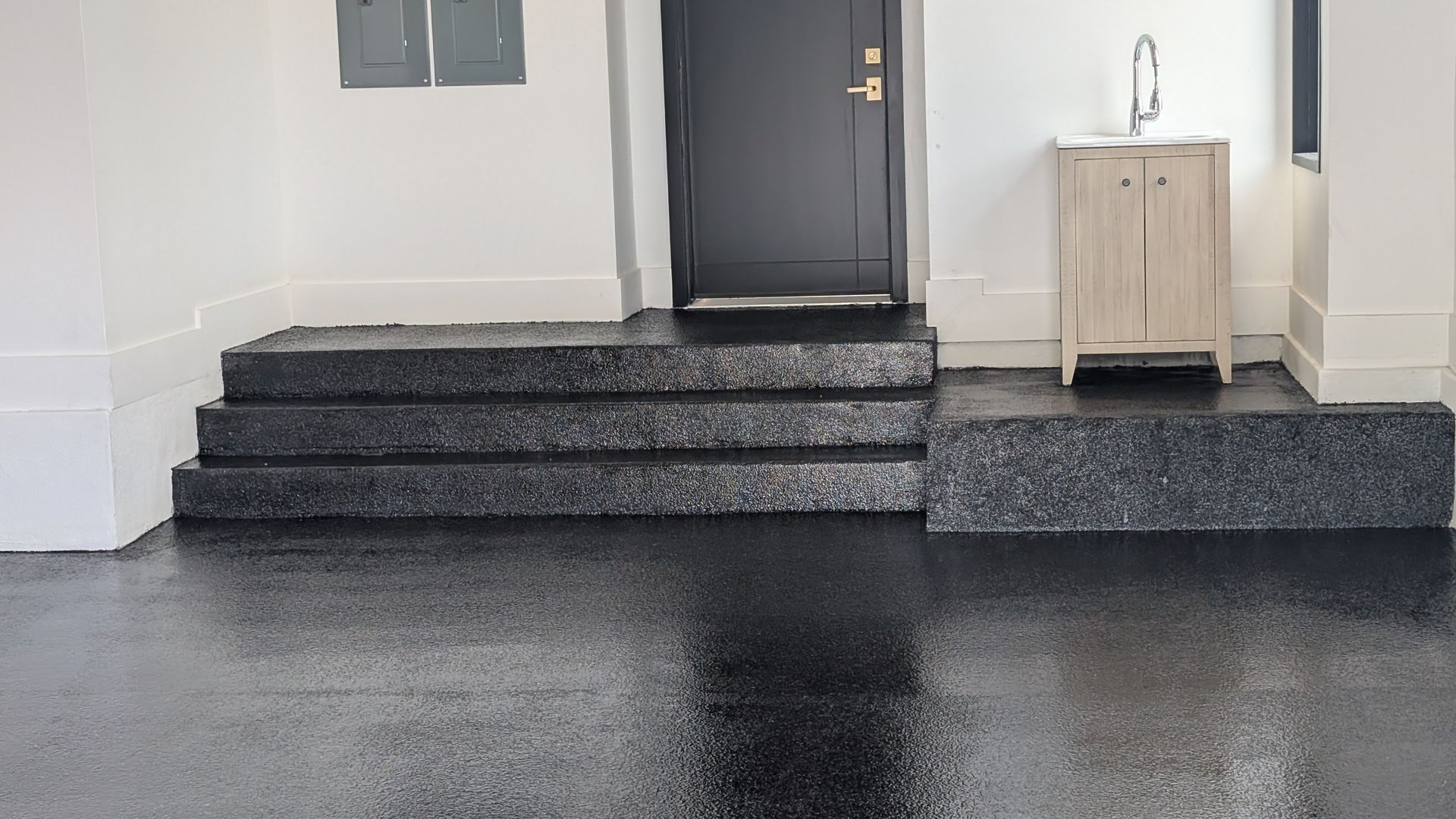 Textured epoxy coating with step detail installed by Zachary Daniel Concrete in Shoals Junction, SC.