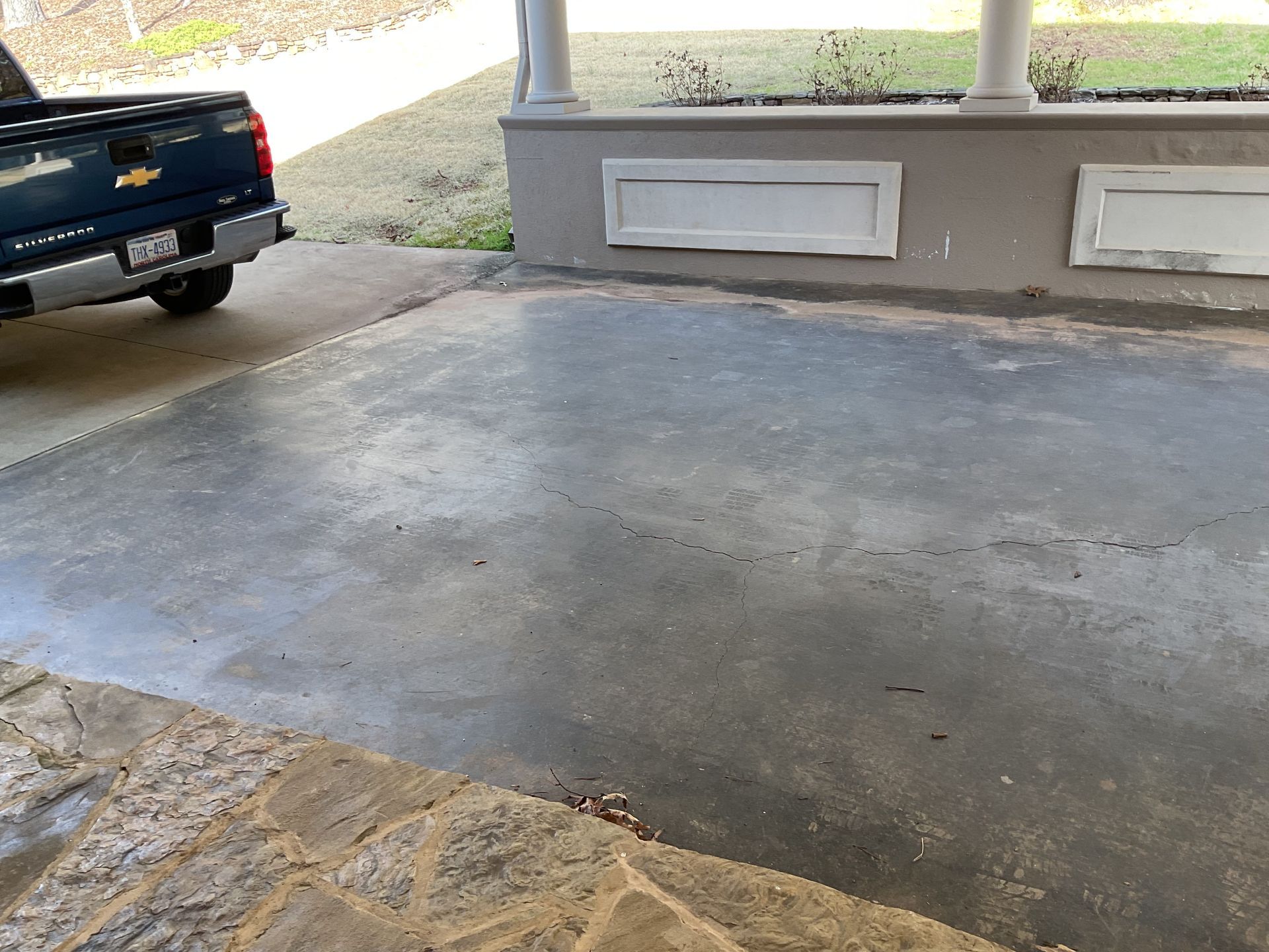 Light gray epoxy flake garage floor installed by Zachary Daniel Concrete in Rutherfordton, NC.