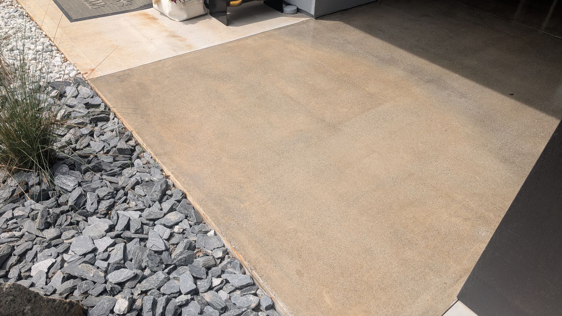 Smooth grind and seal surface with clean stone edge installed by Zachary Daniel Concrete in Sans Souci, SC.