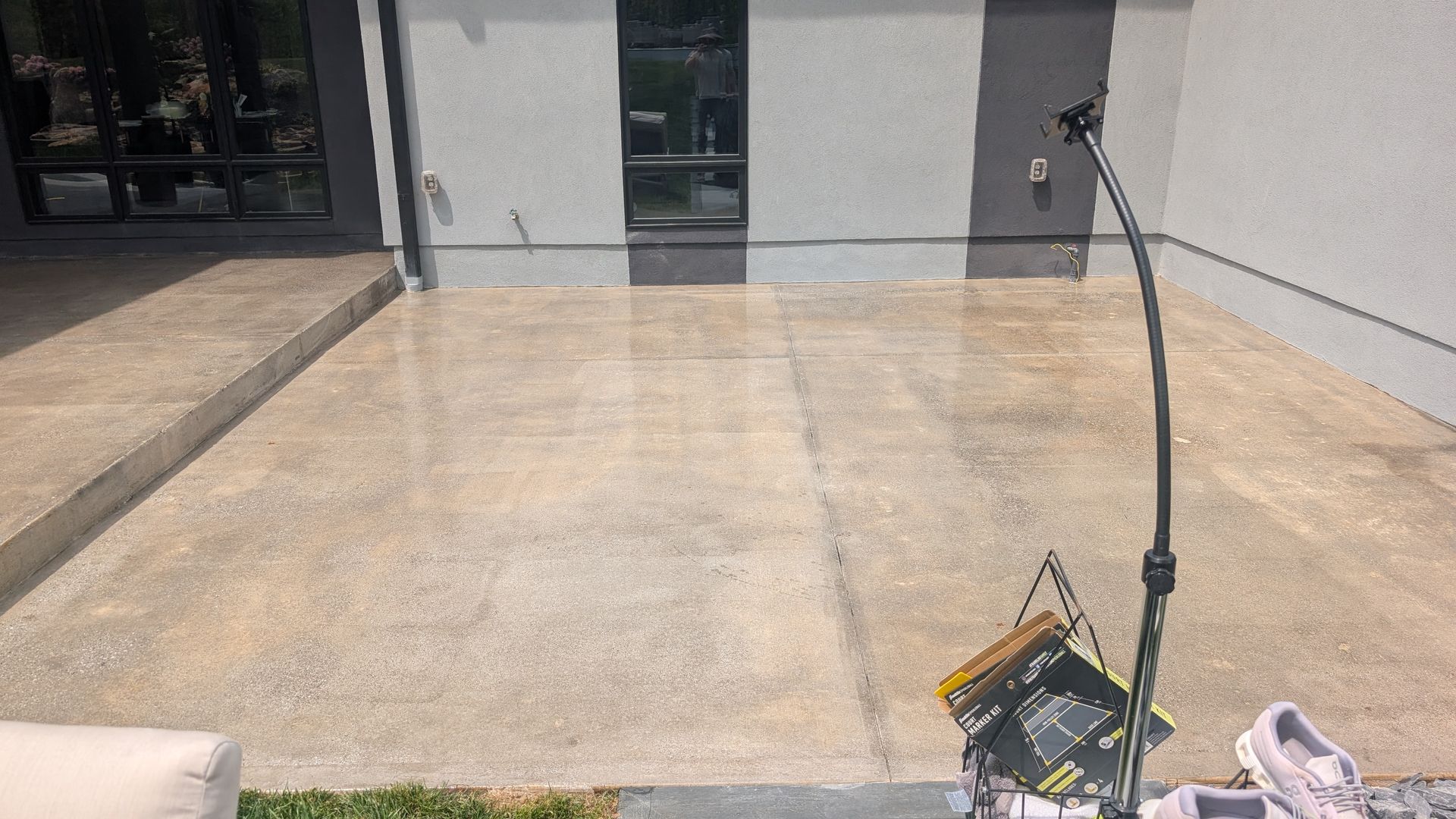 Freshly coated concrete entrance with clean joint lines installed by Zachary Daniel Concrete in Taylors, SC.