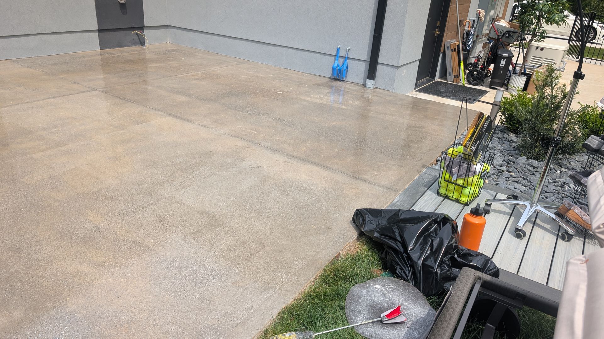 Landscaping beside newly sealed driveway edge installed by Zachary Daniel Concrete in Fountain Inn, SC.