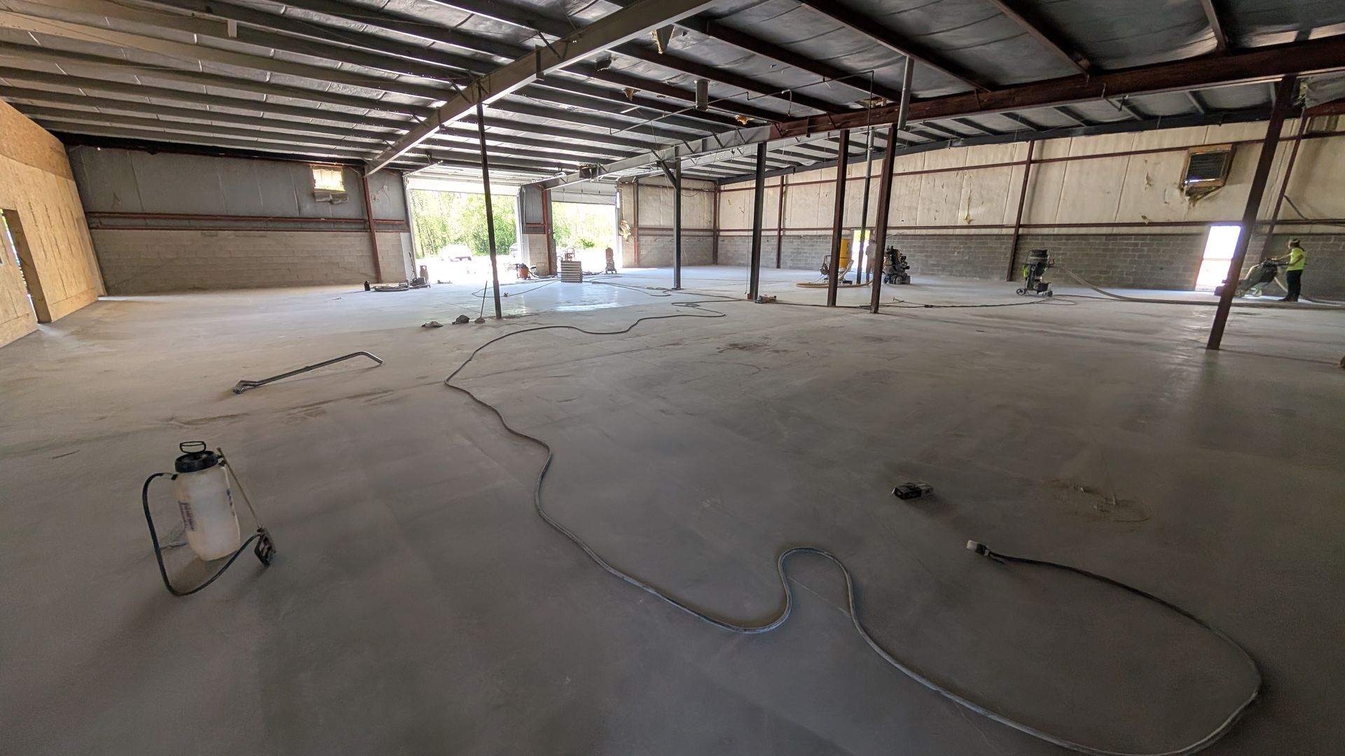 Large indoor concrete prep with Hone Guard coating started installed by Zachary Daniel Concrete in Spartanburg, SC.