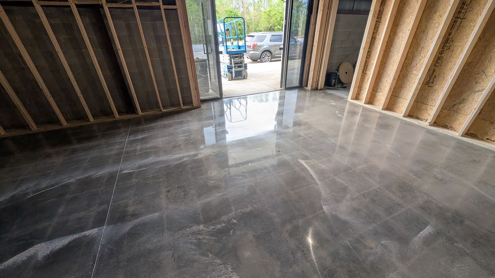 Hone Guard coating in garage entrance area installed by Zachary Daniel Concrete in Lyman, SC.