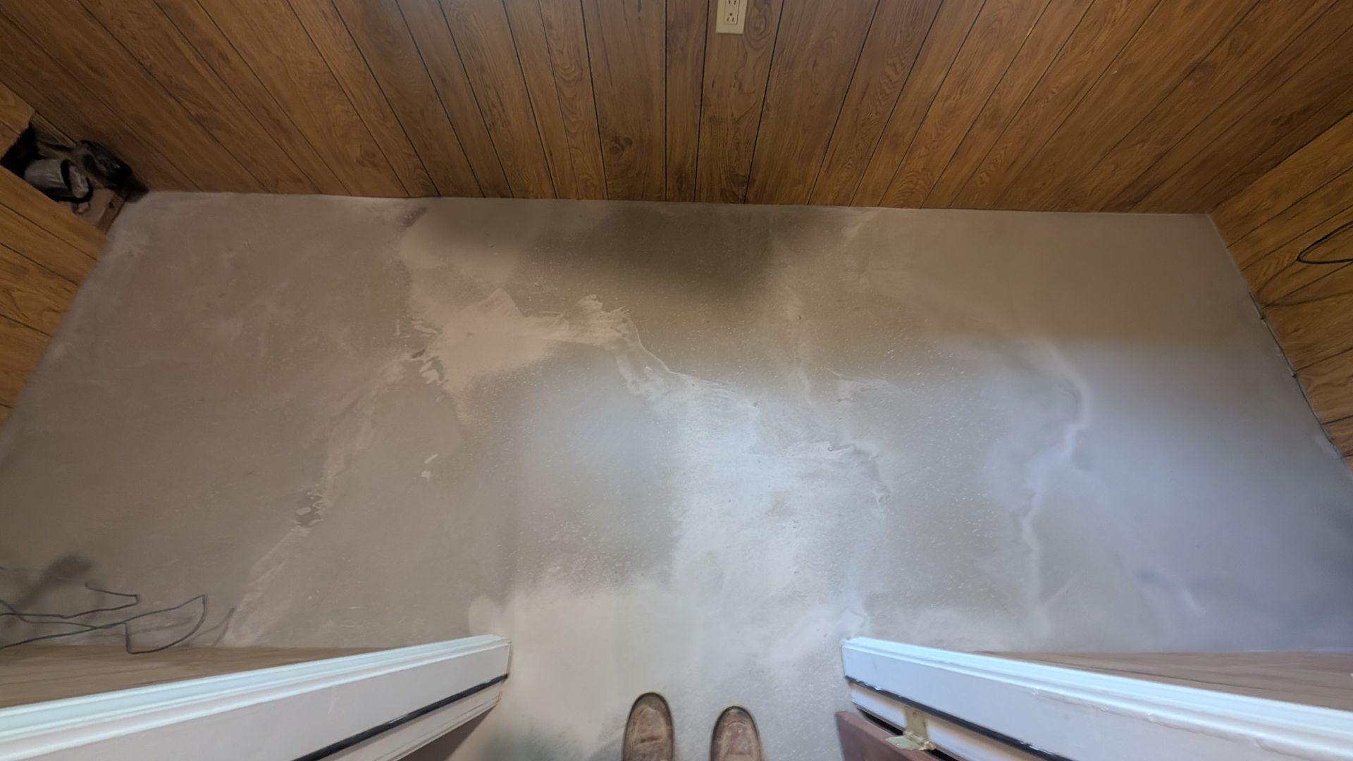 Wide view of self-leveling compound in progress installed by Zachary Daniel Concrete in Six Mile, SC.