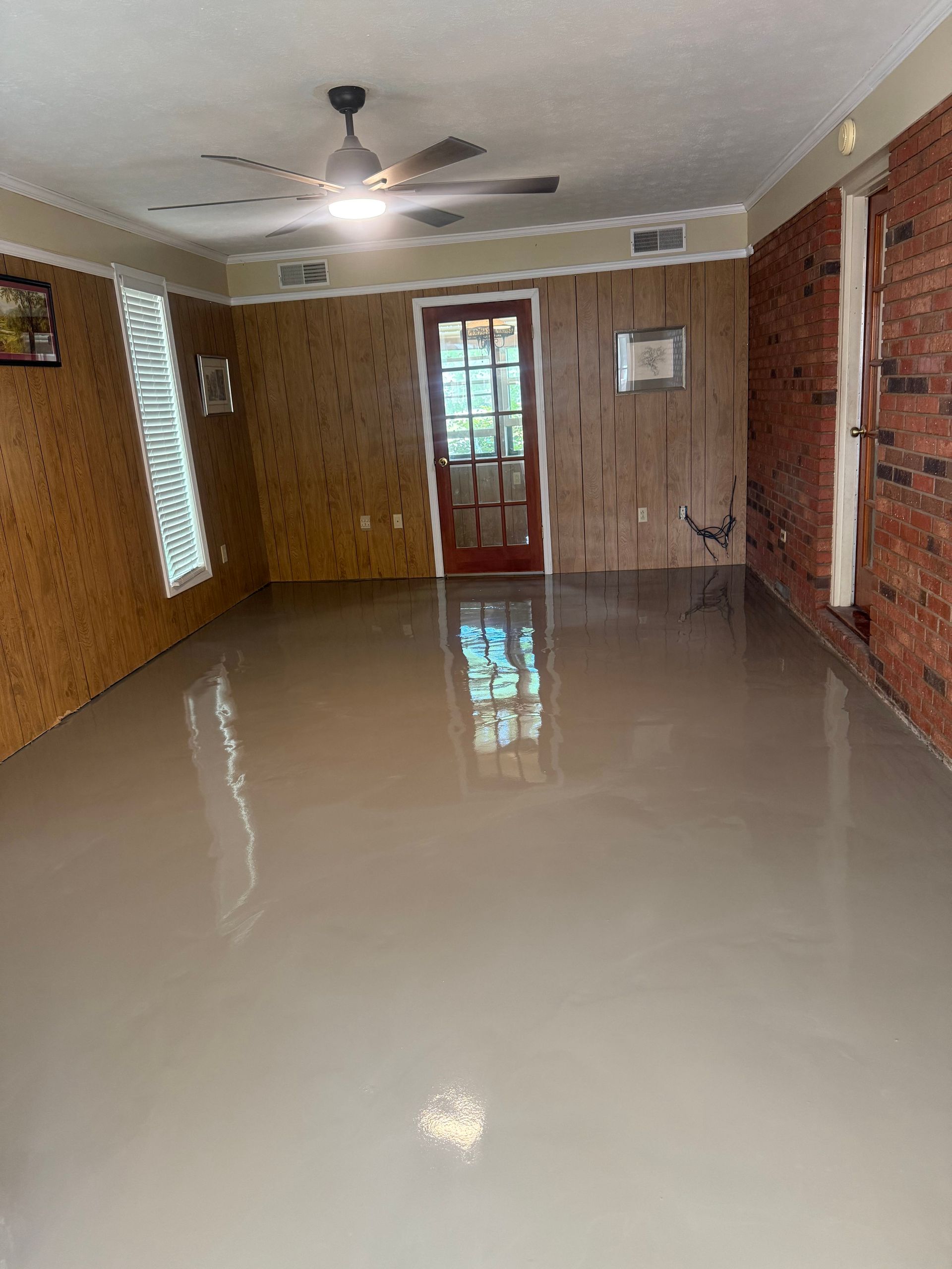 Full room covered in freshly poured overlay compound installed by Zachary Daniel Concrete in Cateechee, SC.