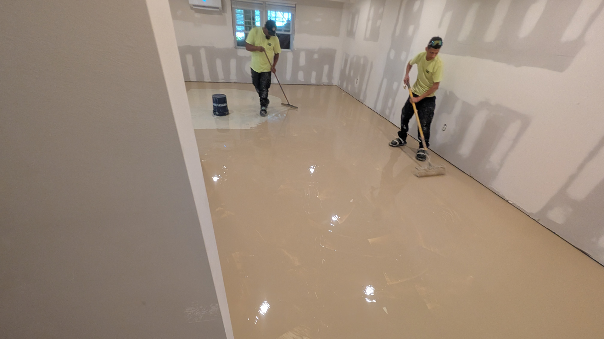 Zachary Daniel Concrete installed black metallic epoxy flooring for a garage in Concord, North Carolina.