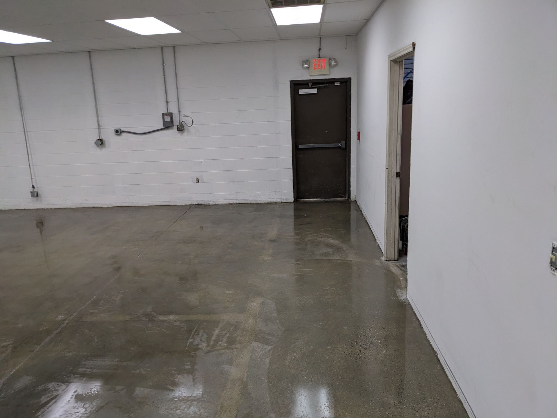 Zachary Daniel Concrete completed commercial floor polishing in a tenant space in Weaverville, North Carolina.