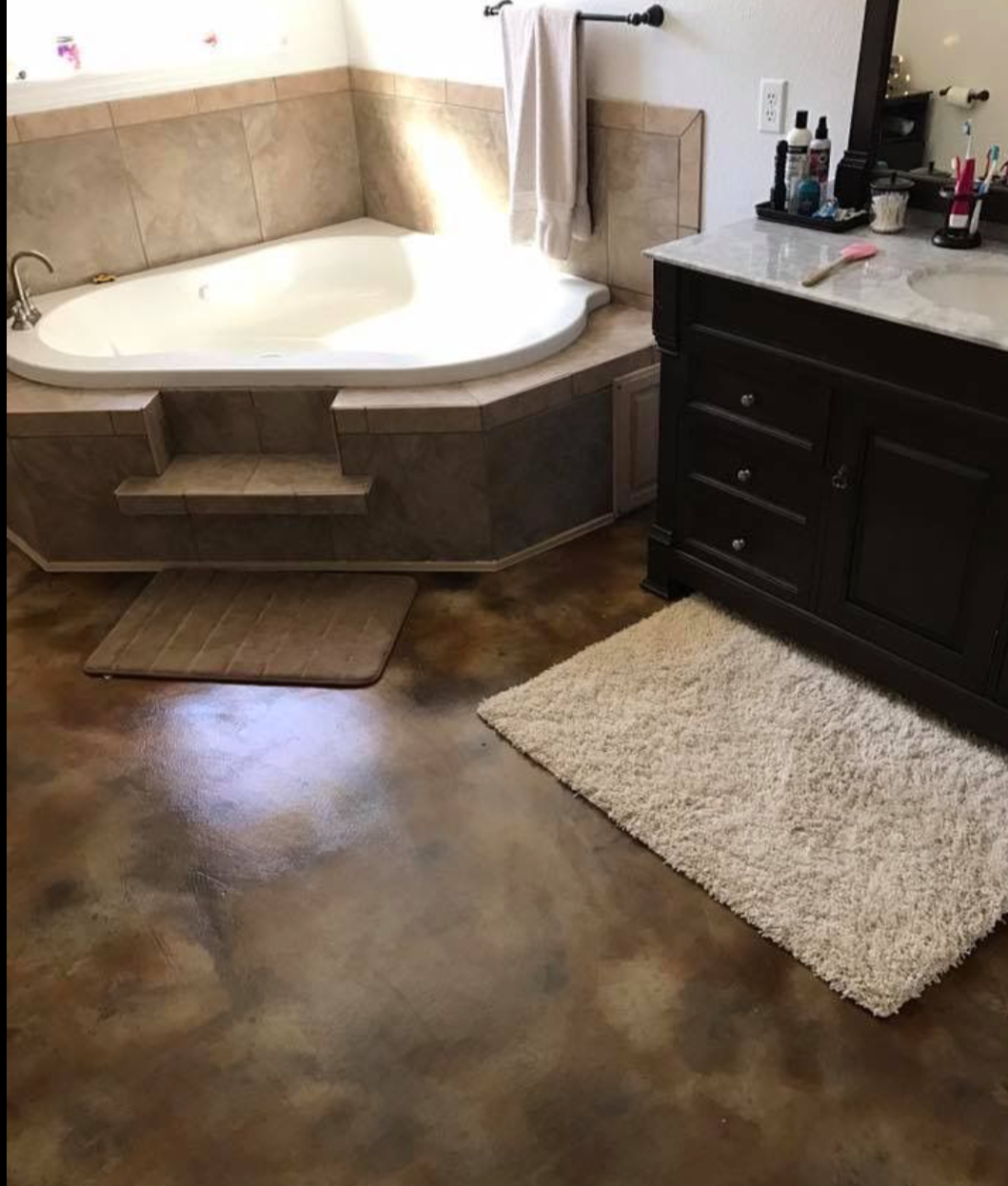 A bathroom with a bathtub and a sink