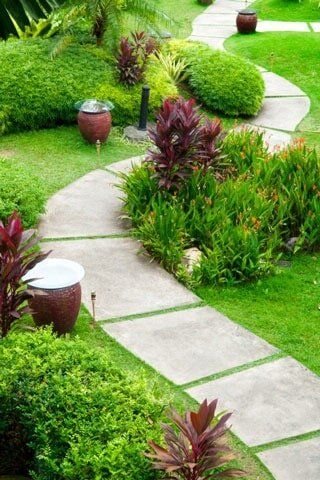 Landscaping Contractor — Garden With Stone Path in Palm Harbor, FL