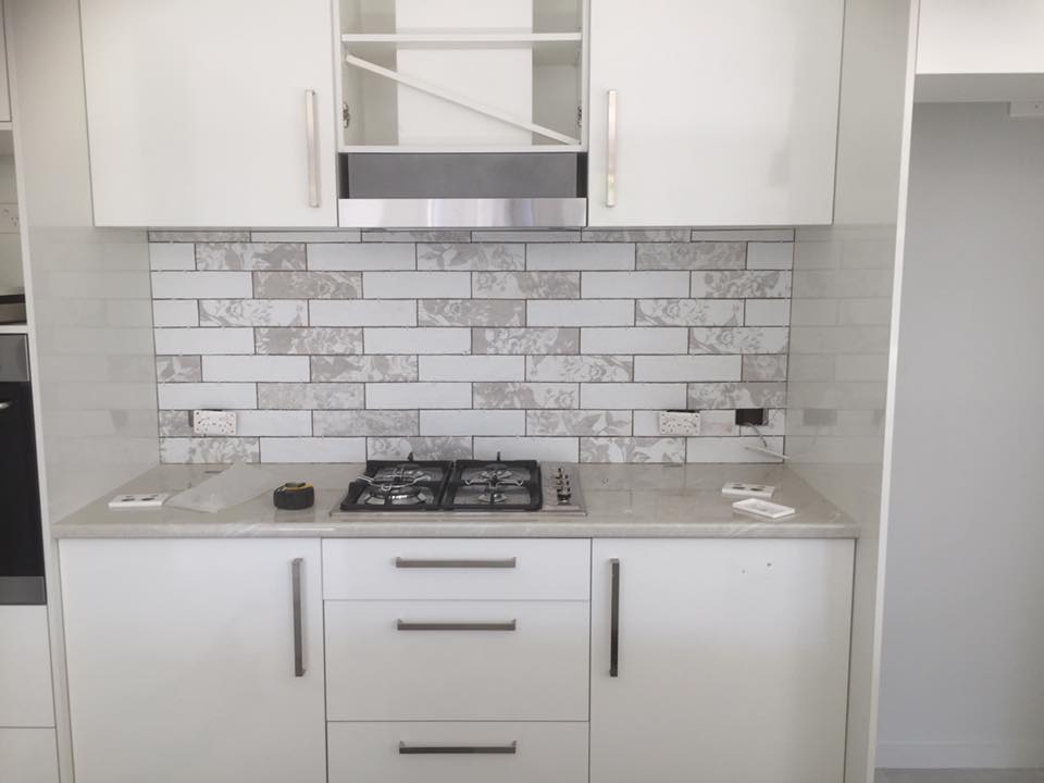 Kitchen With Ceramic Tile Splashback — Tiling and Waterproofing in Coffs Harbour, NSW