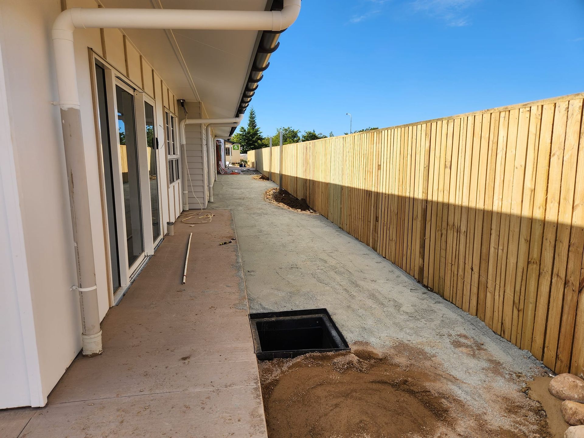 Exterior View of a House With a Wooden Fence — AGM HIRE NQ in Condon, QLD