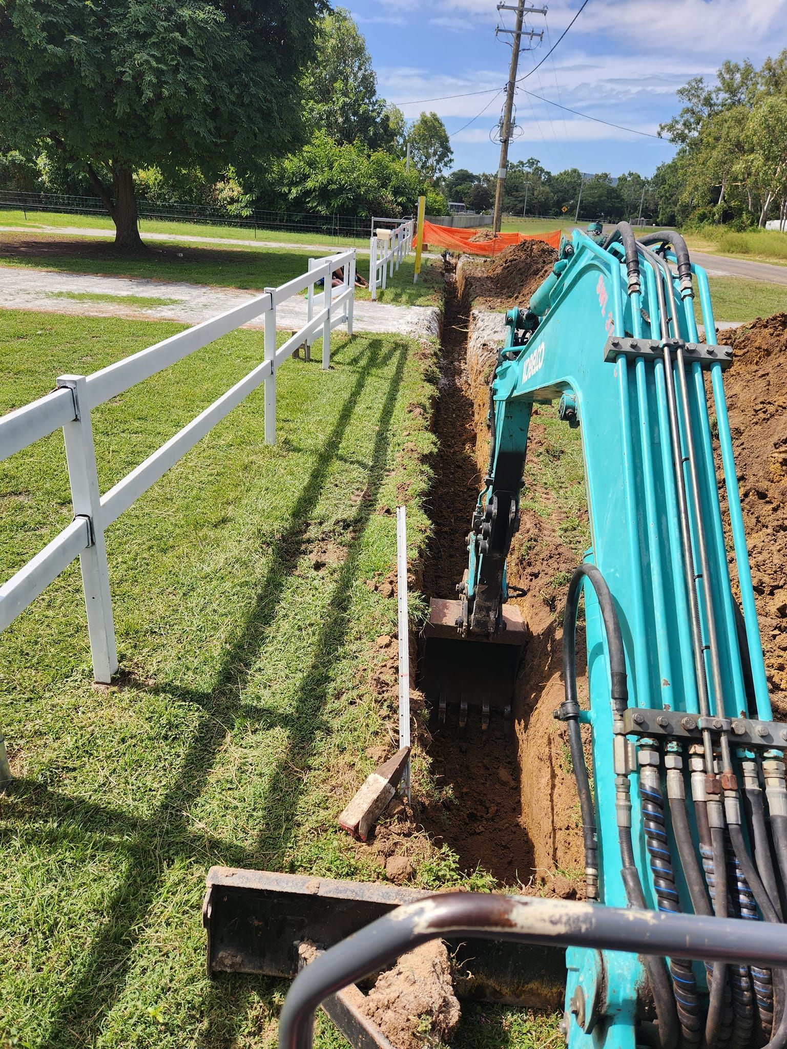 View From a Dirt Hill Overlooking Trees — AGM HIRE NQ in Condon, QLD