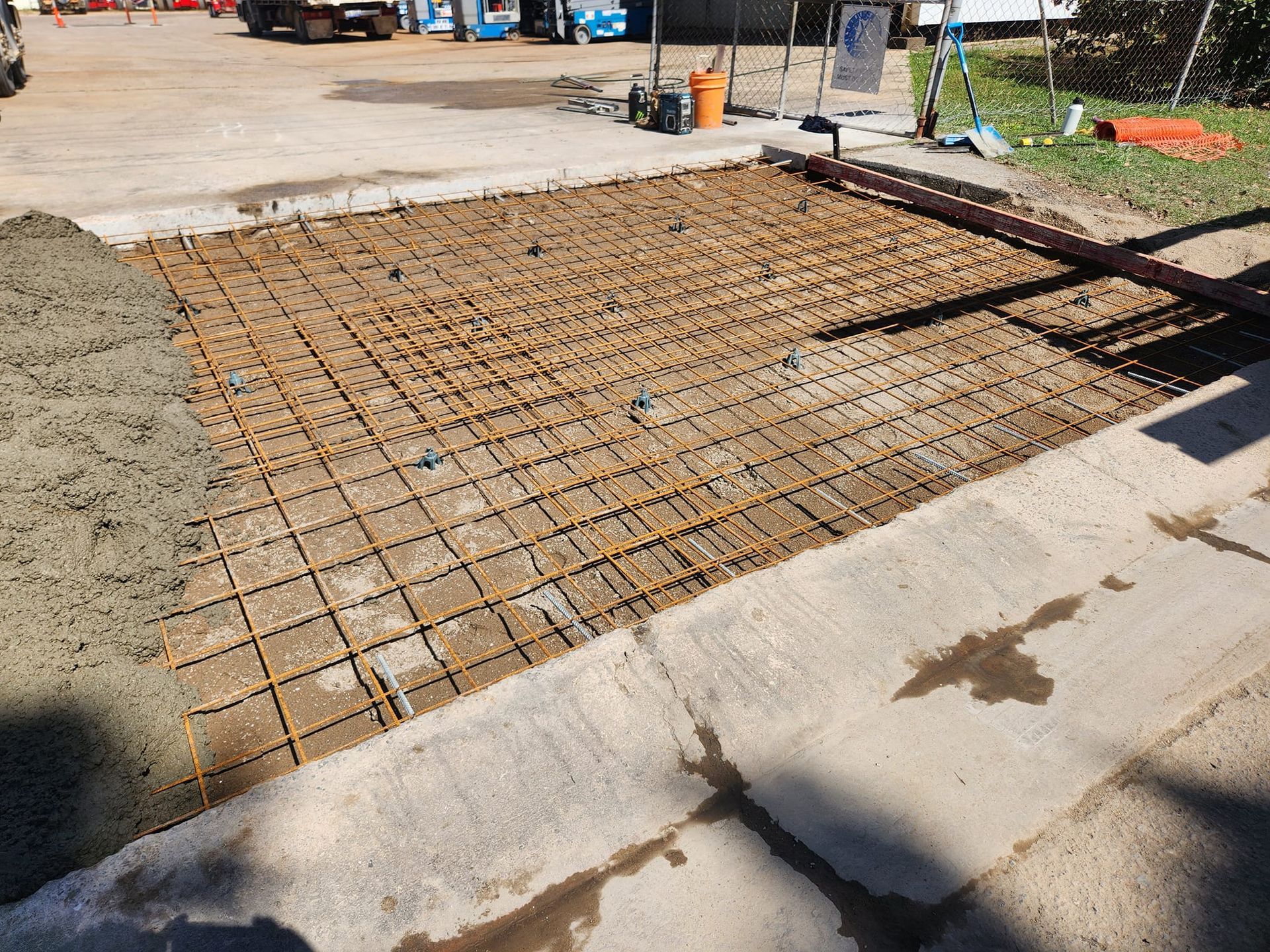 Concrete Work: Rebar Grid Laid in a Parking Area — AGM HIRE NQ in Kelso, QLD