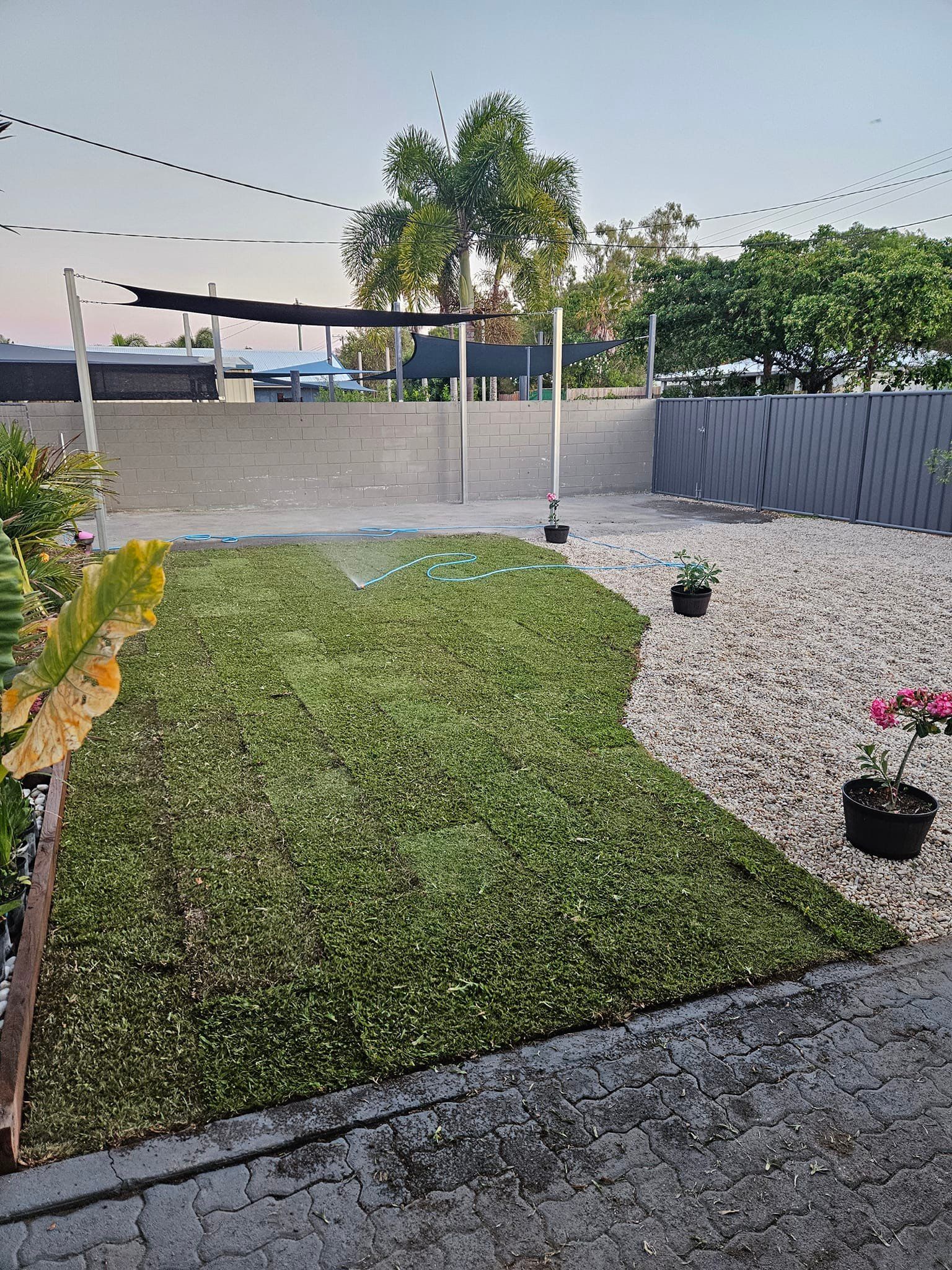 A Backyard With a Green Grass Area — AGM HIRE NQ in Condon, QLD