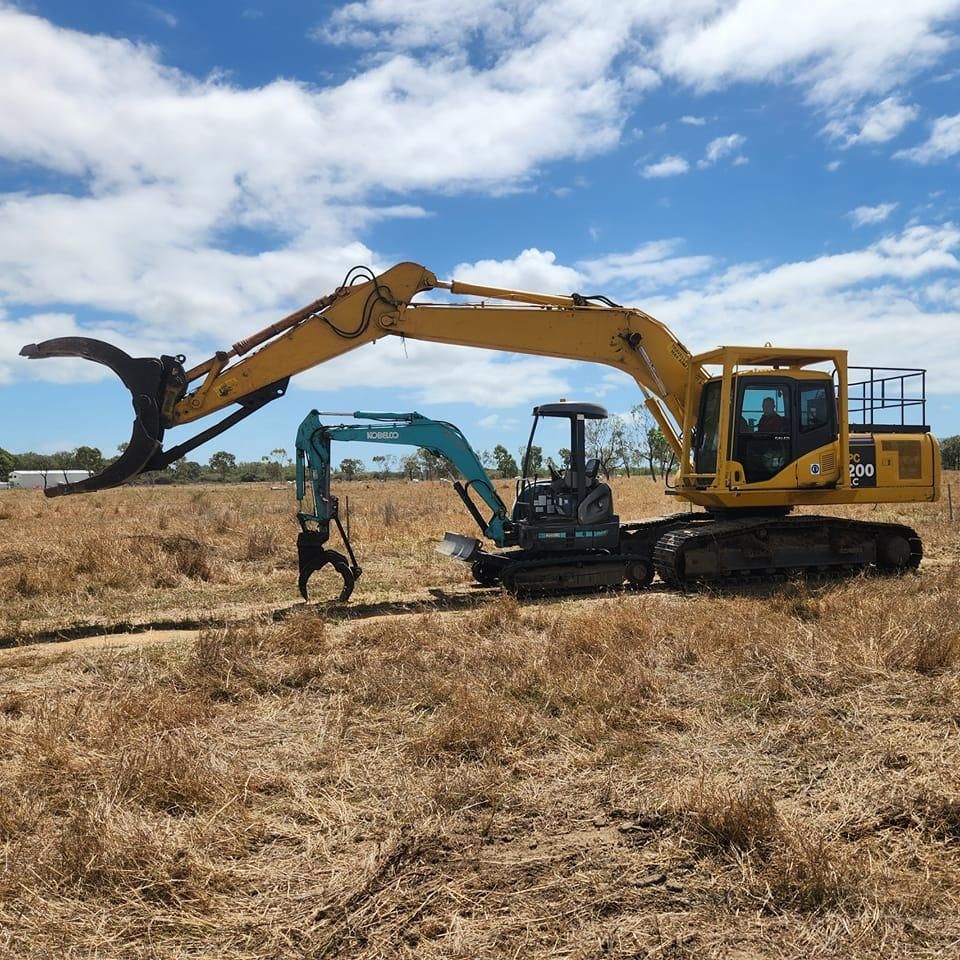 Yellow Excavator With Grapple Arm — AGM HIRE NQ in Condon, QLD