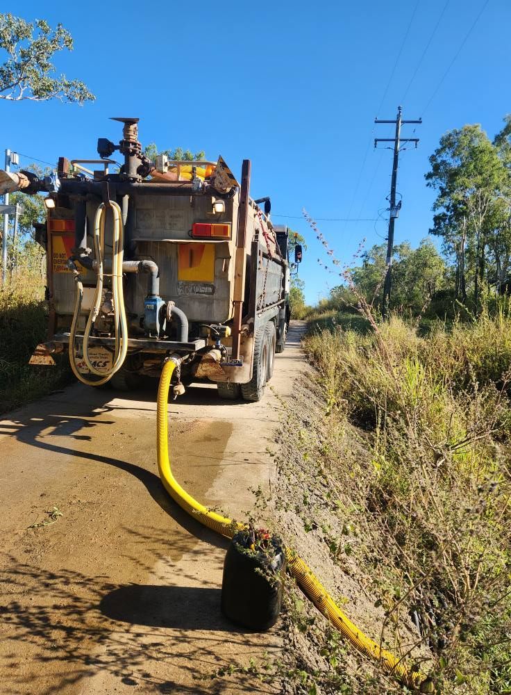A Sewage Truck With a Yellow Hose — AGM HIRE NQ in Kelso, QLD