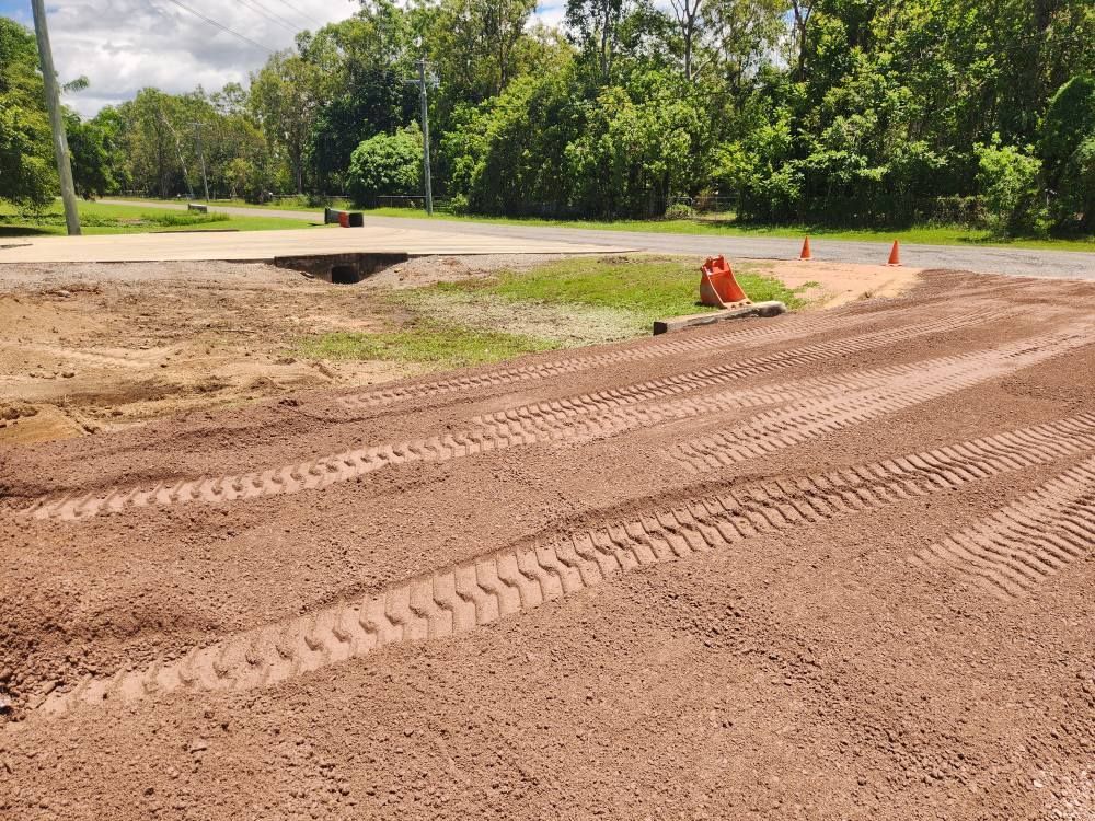 Dirt Road With Tire Tracks, Construction Site — AGM HIRE NQ in Condon, QLD