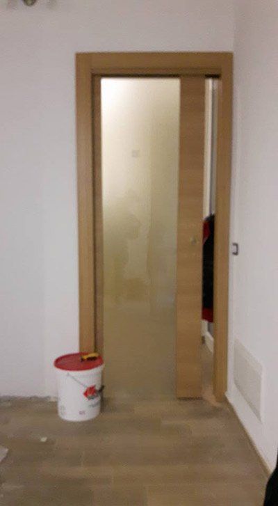 porta in legno intercromatica La Spezia