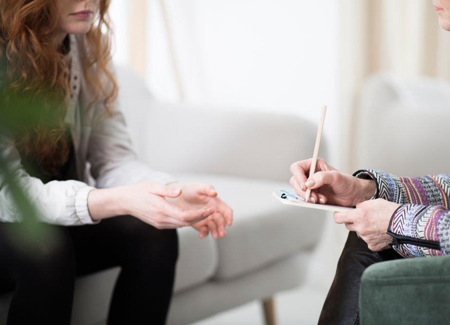 Woman Pushing a Boy in a Wheelchair — Bright Day Psychology in Pialba, QLD