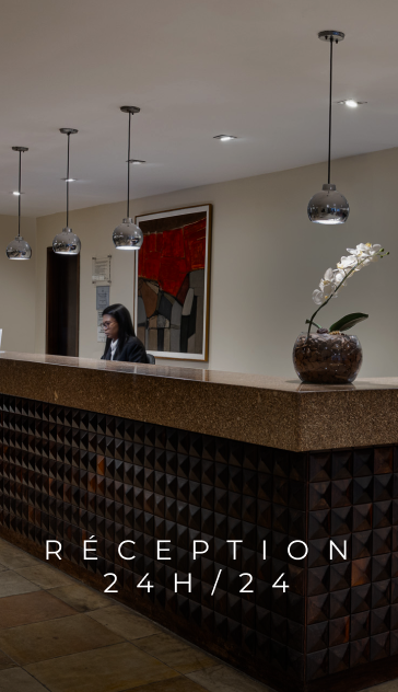 Hotel reception desk with attendant; 
