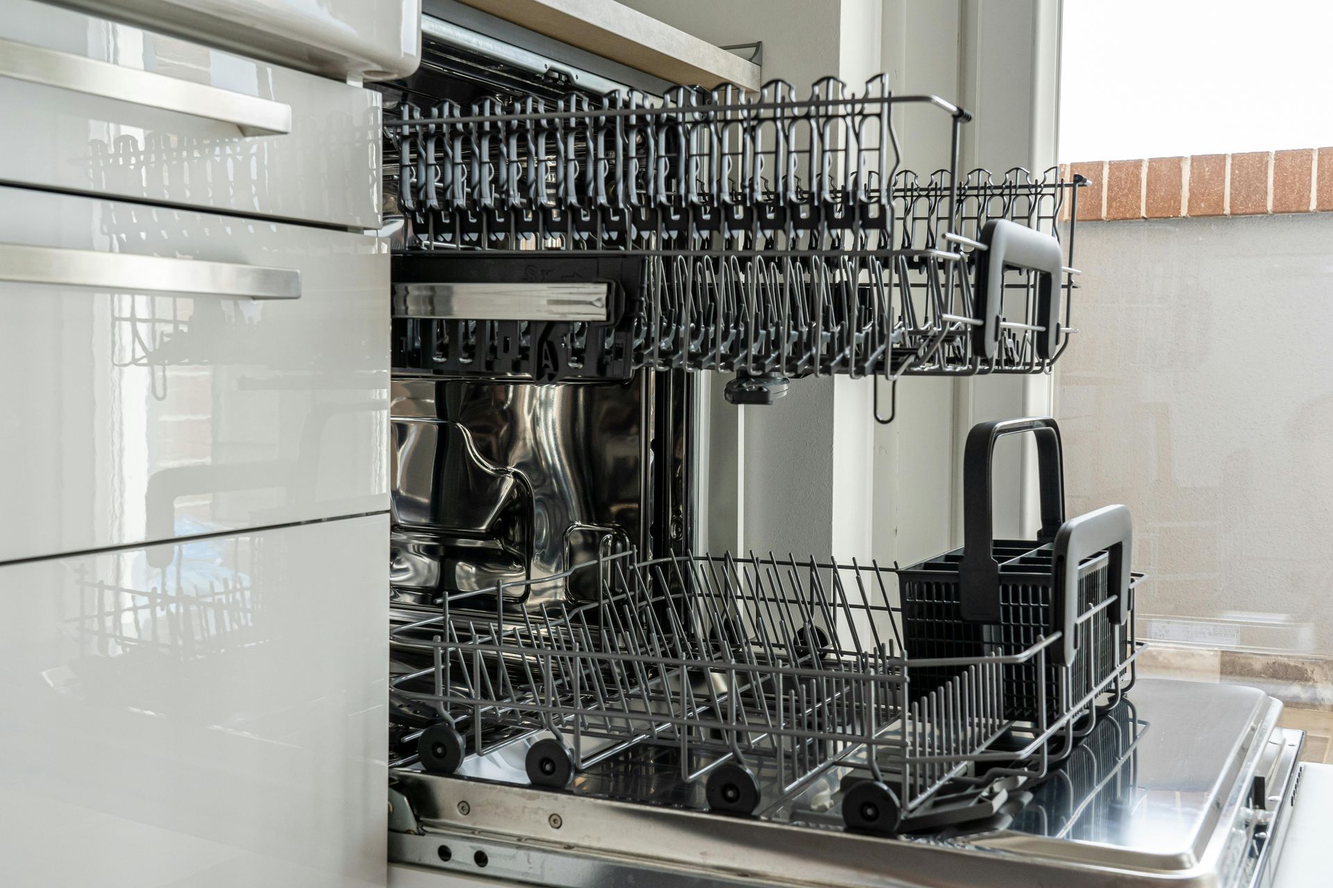 A stove top oven is sitting on top of a cart.
