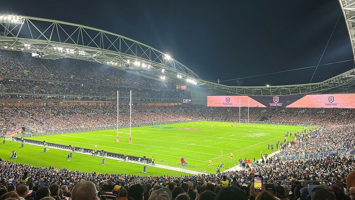 A Stadium Filled With People Watching a Football Game at Night — One Group Industries Pty Ltd in Bathurst, NSW