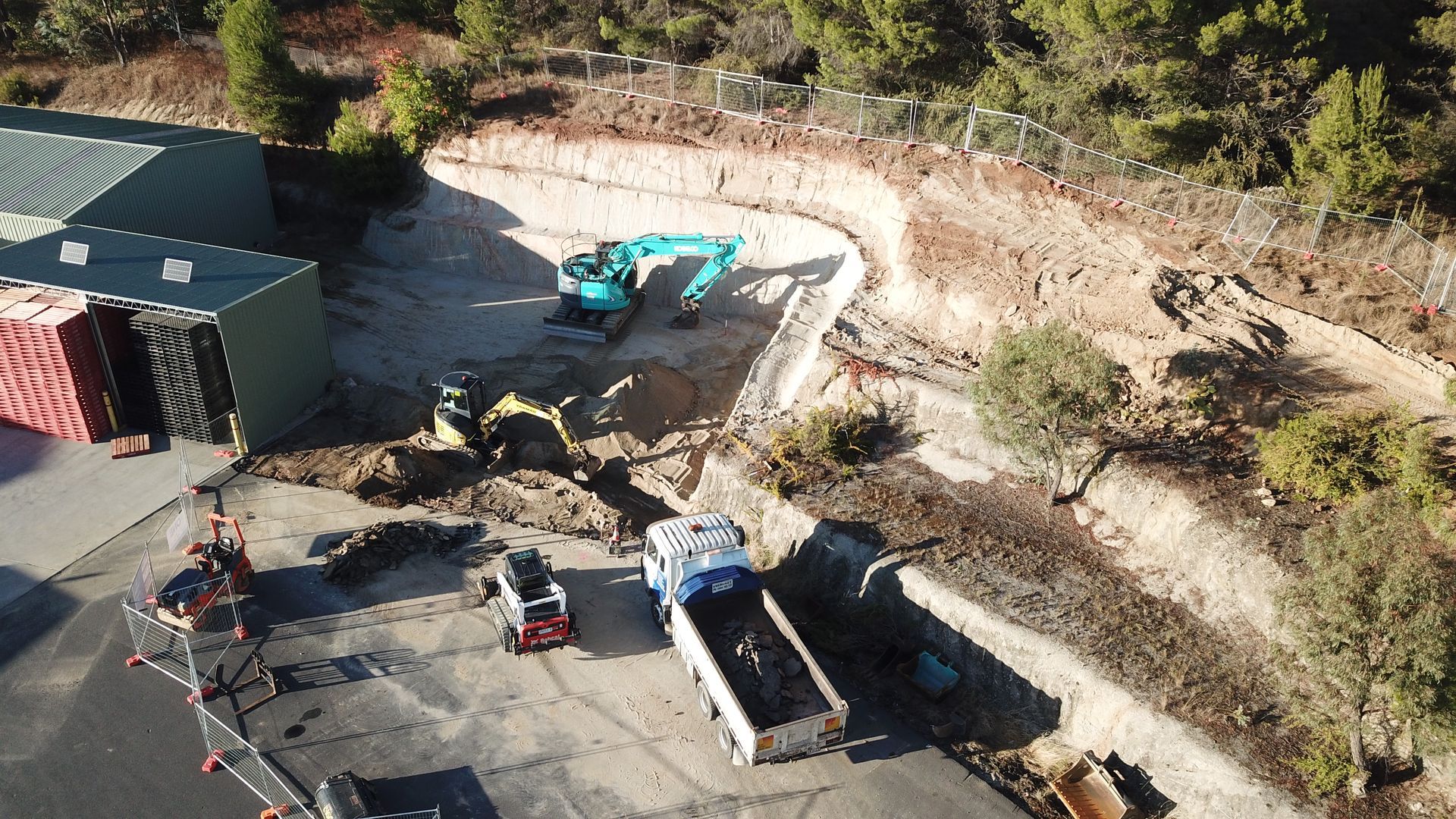 An Aerial View of a Construction Site With Trucks and Tractors — One Group Industries Pty Ltd in Bathurst, NSW