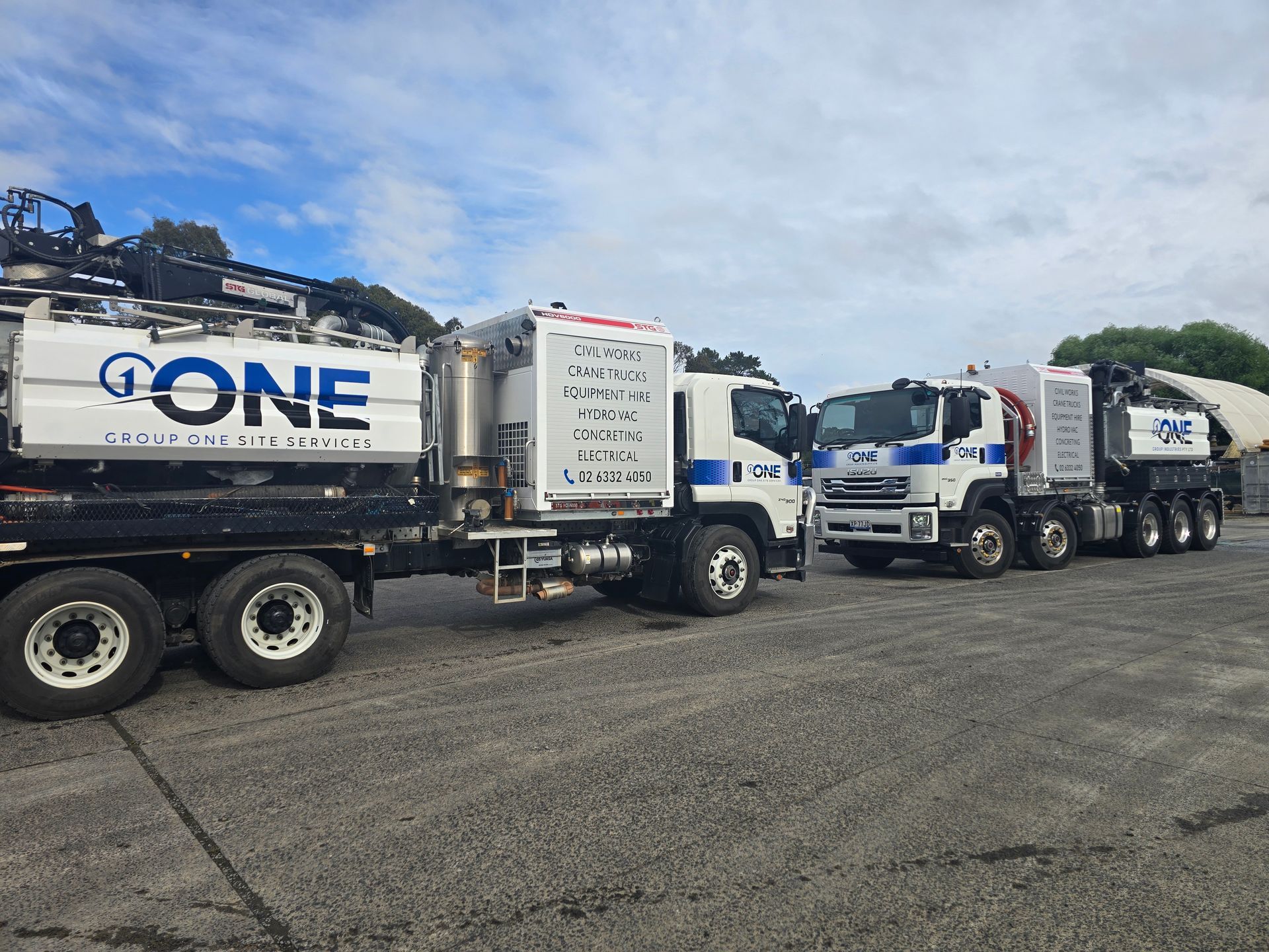 A Hot Tub is Being Lifted by a Crane in Front of a House — One Group Industries Pty Ltd in Bathurst, NSW