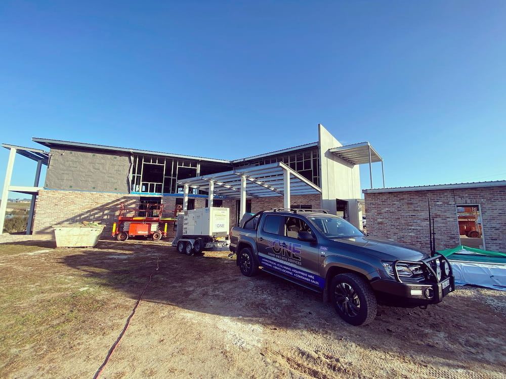 A Truck is Parked in Front of a House Under Construction — One Group Industries Pty Ltd in Bathurst, NSW