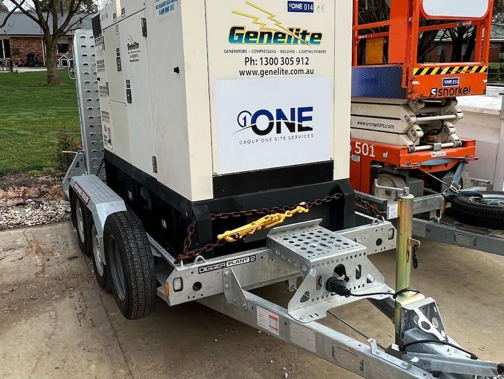 A trailer with a large, beige Genelite generator — One Group Industries Pty Ltd in Bathurst, NSW