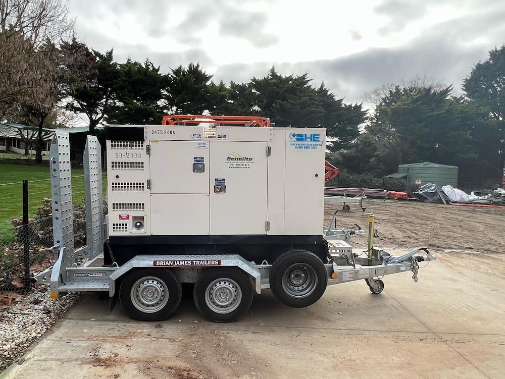 A Trailer With a Generator on It is Parked on a Dirt Road — One Group Industries Pty Ltd in Bathurst, NSW