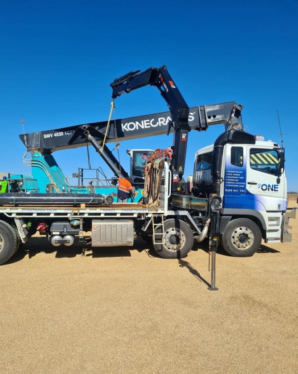 A Truck With a Crane Attached to It — One Group Industries Pty Ltd in Bathurst, NSW