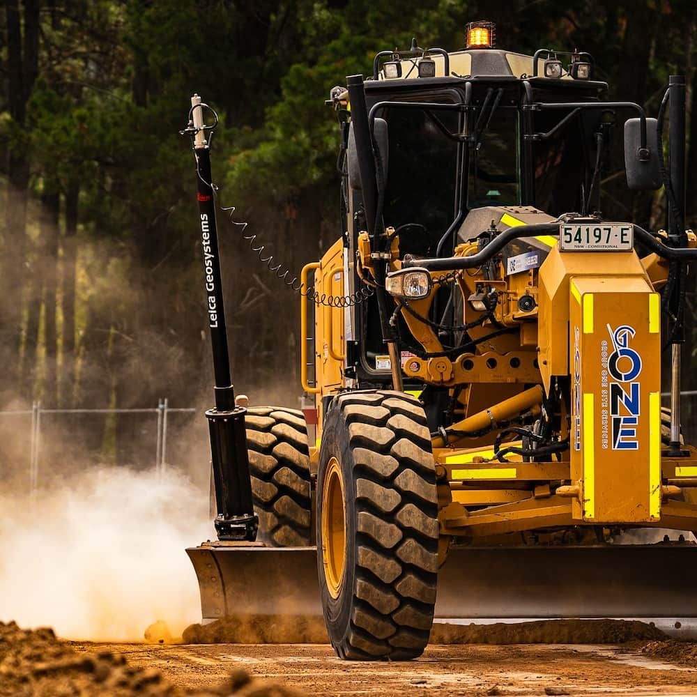 A Yellow Bulldozer With a License Plate That Says 64191-e — One Group Industries Pty Ltd in Bathurst, NSW