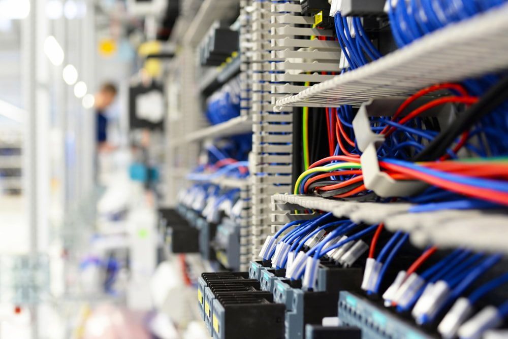 A Bunch of Wires Are Stacked on Top of Each Other on a Shelf — One Group Industries Pty Ltd in Bathurst, NSW