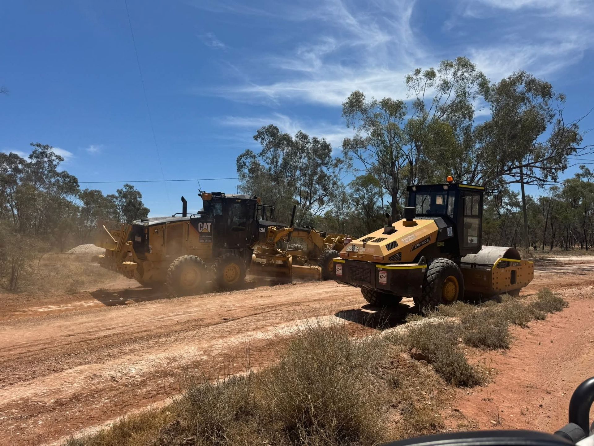 Road Construction Crew in High-Visibility Safety Gear — One Group Industries Pty Ltd in Bathurst, NSW
