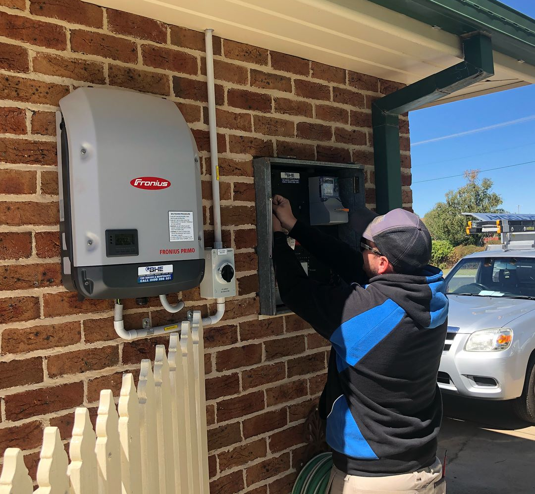 A Bunch of Red Batteries Are Sitting on Top of Each Other on a Table — One Group Industries Pty Ltd in Bathurst, NSW