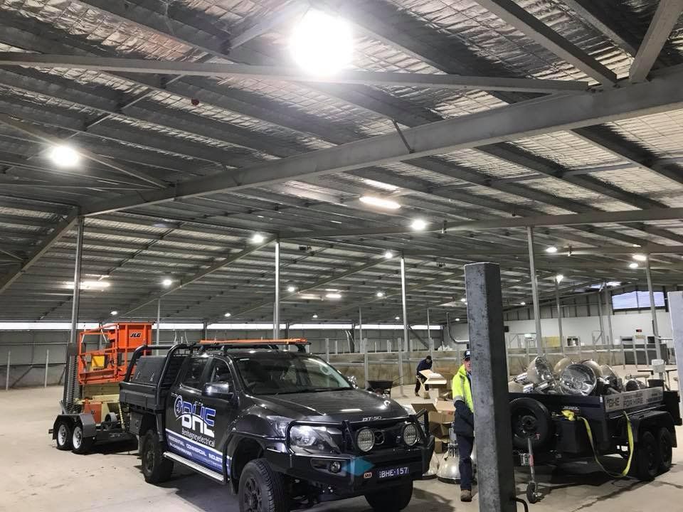 A Truck is Parked in a Warehouse Next to a Canoe — One Group Industries Pty Ltd in Bathurst, NSW